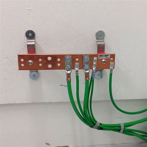 installing ground bus bar on electrical panel